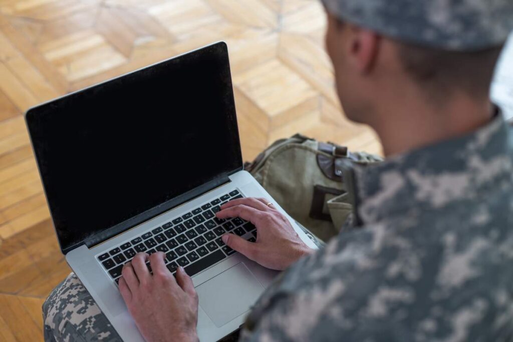 Active-Duty Military Student Working On His Laptop