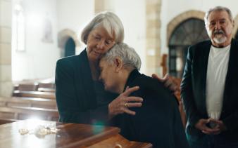 Funeral home managers offer condolences by providing compassionate support to grieving families.