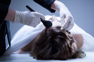 Mortician Preparing Body for Funeral