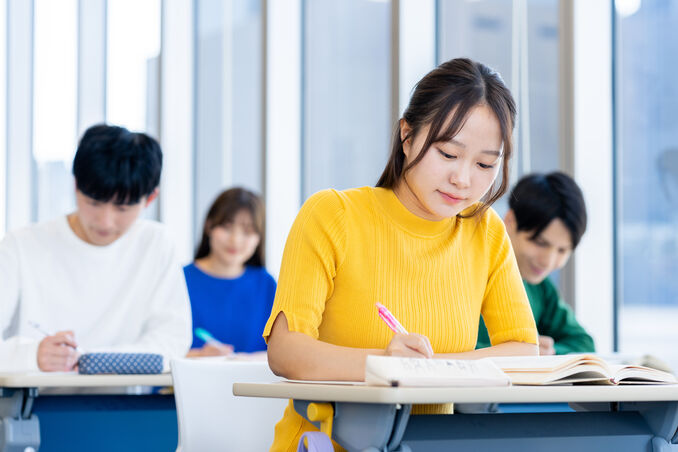 college students on studying in  classroom