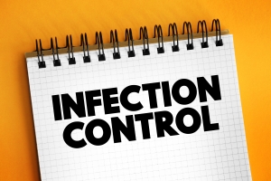 Infection Control Text on Notebook